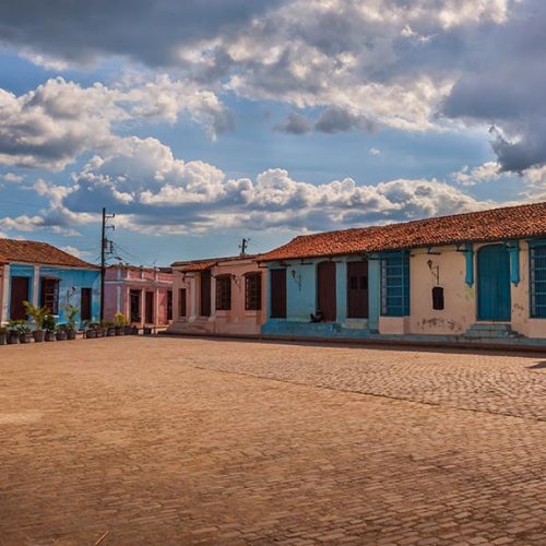 San-Juan-de-Dios-square-with-colorful-colonial-houses-Camaguey-Cuba